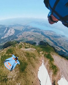 Down the slopes and through the clouds... This is a flight to remember ☁️⛰🙌 🪂: Andy Farrington & Mike Swanson | Red Bull Adventure