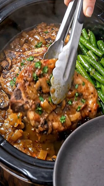 Slow Cooker Savory Mushroom Pork Chops 🥩🍄🌱.#porkchops #slowcookerrecipes #mushroomgravy #easy