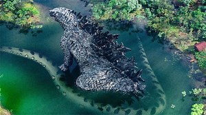 原始森林里霸王龙被巨蟒吞掉，哥斯拉直接手撕巨蟒