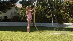 Two Children Playing Water Hose Garden Stock Footage Video (100% Royalty-free) 31203310 | Shutterstock