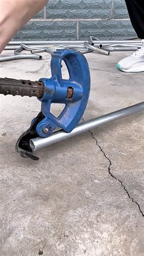 manual pipe bending tool in action