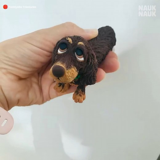 🌞 Happy Friday, everyone! Meet Monty Bojangles — my little chocolate-and-tan dachshund made from polymer clay. 🍫🐾 (You can probably guess how he got his name… he looks almost good enough to eat!) I’ve given him a bit of life today using a sprinkle of AI magic — my models don’t really move, it’s just for fun! ✨🎞️ Hope Monty brings you a smile to start your weekend. 💛 #PolymerClay #ClayArtist #Miniatures #DachshundLove #MontyBojangles #CuteReels #AIAnimation #ClayArt #MakerLife #FriYay #Small
