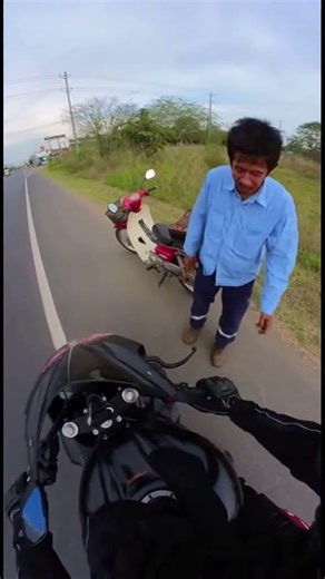 Biker’s Kind Gesture Caught on GoPro | Ran Out of Gas #shortsfeed #biker #road #help #kindness