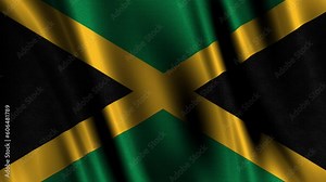 The graceful fluttering of the Jamaica flag as it dances in the gentle breeze.