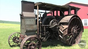This is a 1912 International Harvester 15-25 “Mogul Jr” Tractor. This tractor is essentially half the engine and horsepower of its larger brother the 45 Mogul. It has a single cylinder, gasoline engine with igniter and magneto ignition. It's rated at 15 horsepower on the drawbar and 25 horsepower on the belt. It uses the same cooling system as the 45 Mogul tractor. The Mogul Junior was built from 1911 to 1913 with a total production of around 800. This tractor sold on the Aumann Vintage Power 20