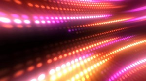 Download Vibrant light pattern in shades of purple, blue, and pink, forming a dynamic wave-like texture. Perfect for digital and futuristic visuals background for free