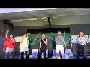 BIOMAN Team singing “Choudenshi Bioman” theme song