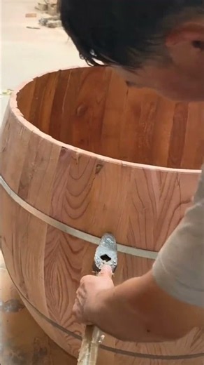 Traditional cooperage craft，fixing metal hoops for huge wooden barrel#shorts
