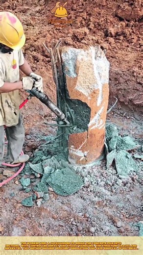 Skilled Worker Demolishing Concrete Column Using Jackhammer for Precise Break