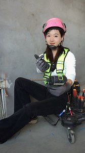 Watch as a skilled electrician woman expertly joins cables like a true professional! Her precision and organization shine through as she effortlessly handles each task, using the most appropriate electric tools for the job. Every connection is clean, every wire perfectly aligned, showcasing her dedication to safety and efficiency. Her expertise makes the complex look easy, and her attention to detail ensures that everything is in top shape. A true champ in her field! | Asian Technology