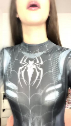 Stylish Spider-Themed Costume Showcase in Bedroom