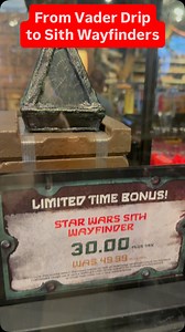 The Star Wars Trading Post is serving looks and legend! 🌌 From the latest Vader Drip (that hat/tee combo is 🔥) to high-end treasures like that hand-carved Grogu statue, there is so much to see at Downtown Disney right now. But the real mission? The Sith Wayfinders and Ahsoka Legacy Sabers are officially on SALE! ⚔️ Plus, if you’re a fan of Ahsoka or Sabine Wren, you have to see these Special Edition dolls in person—the detail is incredible. Are you here for the fit or the force? | Galaxy's Edg