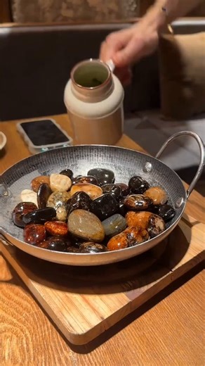 Pebbles eggs, cooked on hot stones for a unique taste and texture