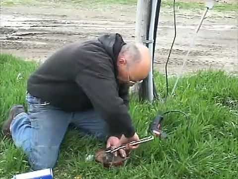 Hand operated water pump installed through a well cap