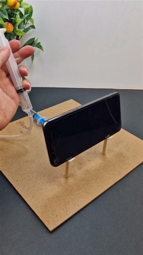 Pneumatic mobile phone holder for watching movies | #dcmotor #techexperiments #tech #experiment