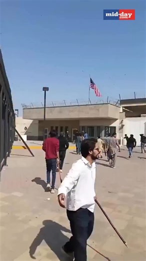 Protesters gathered outside the US Consulate in Karachi, condemning recent American and Israeli strikes on Iran. Demonstrators vandalised property and clashed with police, prompting tear gas deployment and roadblocks around the diplomatic zone. Marchers linked to Shia groups advanced toward the mission, with parts of the entrance reportedly set ablaze. Authorities tightened security as anger mounted nationwide, reinforcing barricades to prevent further escalation. VC: X | MiD DAY