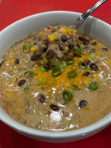 Simple Savory Soup! Mealtime will be cozy and tasty with this nacho soup. It's perfect for taco Tuesday during the cold weather. And while you're at it, why not add some additional veggies that you might prefer. Make your tastebuds and belly both smile. #dinner #soup #mexicanfood #slowcooker | Scott & Karen
