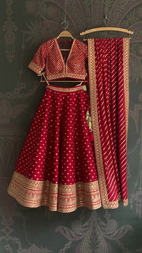 SwatiManish LehengasPrice:₹ 52,800 INR - INDIA$ 928.00 USD - OverseasCode No.: SMF LEH 820 356Description: Red thread work sequin dupion silk Lehenga with matching chinos crepe dupatta and sequin blouseThe can-can is not included.₹ 4,500 INR - Can-can₹ 3,750 INR - Shipping within India | SwatiManish