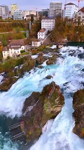25K views · 472 reactions | The magnificent Rhine Falls is a waterfall located on the border between the cantons of Schaffhausen and Zurich, Switzerland. Large volumes of water tumble over the rocks across a width of 150m (492f), creating an impressive nature show. Have you visited any famous waterfalls?  Rheinfall near Schaffhausen  instagram.com/shahinfarajov | DW Travel | Facebook