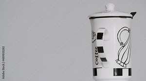 Coffee mug spinning on the right side of the screen - stock video