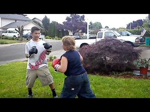 Kid gets punched in the face!!