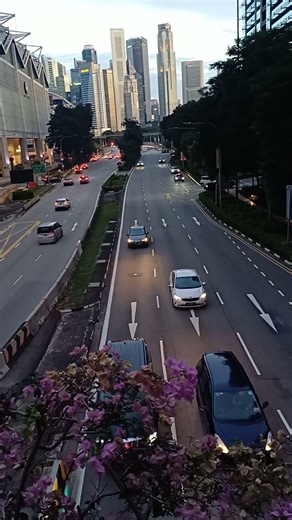 Breathtaking views of the city Sunset magic on Suntec-South Beach Tower Linkway Bridge #travel #fy