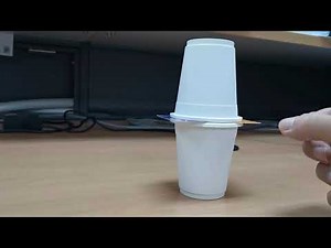 Inertia Demonstration using 2 cups and a card