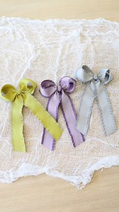 - don’t pull the bun all the way through (leave a little tail) while keeping 1 finger in the elastic - I like to twirl the little tail around my finger a couple of times to keep the hair more neat and together - Stuff the tail back into the elastic - Fan the bun out #toddlerhairtutorial #hairhack #toddlerhair #messybuns #pandabuns #toddlermessybun #hairtipsandtricks | Kelsey Hinshaw