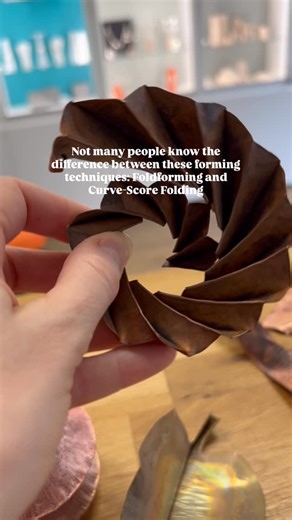 FORGE | Learn, Make, Buy Jewellery on Instagram: "Here’s the difference between these two sculptural forming techniques👇✨ We’re often asked if these two sculptural metal-forming techniques are the same, just described differently. They’re not. While both create bold, dramatic forms, the processes and results are very different. ⚒️Foldforming is a technique pioneered in the 1980s by metal expert @charleslewtonbrain . It involves repeatedly folding sheet metal, forging or hammering it, then unfol