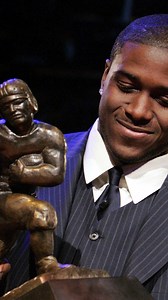 Reggie Bush, after years spent fighting to retake his place among college football's most prestigious fraternity, is finally getting his Heisman Trophy back. AP's Greg Beacham has more. | AP