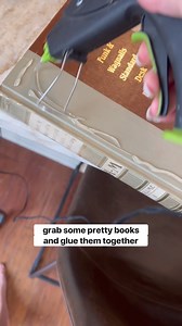 Outdated books are often thrown away, but here's how I used mine to hide an eyesore in my living room. 🎨😏 | Maggie McGaugh
