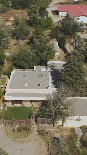 An adobe home & casita circa 1910 that has been updated with all the right touches to compliment the original charm. Hand-carved features can be found throughout the home. A large portal greets you and beckons you to morning coffee watching the many migrating birds that visit. With 8 skylights and many large windows this home has all the natural light you could ever dream of. Cozy up to one of the 3 kivas that adorn the living areas and kitchen. The main house has 3 bedrooms & 2.5 baths. The spa