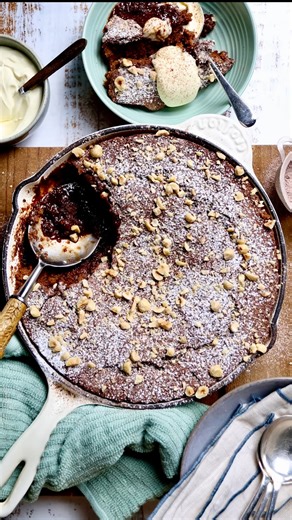 Chocolate Hazelnut Self Saucing Pudding is a classic comfort food dessert. Quick to make and one that everyone will love! Ingredients 100g Butter Melted 1 Tbsp for Greasing 250g Self Raising Flour 150g Brown Sugar ¼ Cup Hazelnuts 100g Hazelnut Chocolate 200ml Dollop Cream 175ml Milk 3 Eggs 75g Cocoa 1 Tsp Baking Powder For the Sauce: 300ml boiling water 200g sugar Method 1. Preheat the oven to 170°C and grease a baking dish using 1 Tbsp of butter. In a large mixing bowl mix together the milk, eg