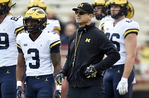 What is Jim Harbaugh’s record vs. Ohio State?