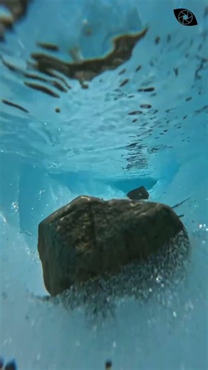 The Glacial Trench: A Sculpted Pathway Carved by the Relentless Flow of Ice-Cold Water