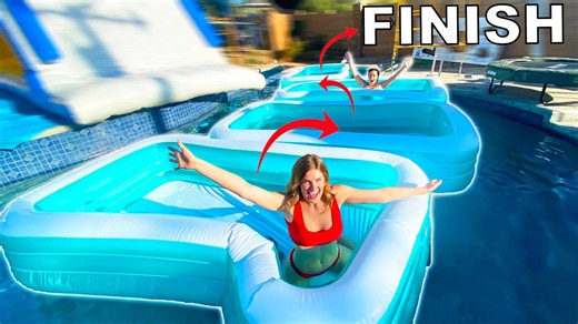 Contestants battle to become the first to conquer the Wipeout course