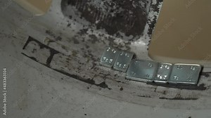 Close-up view 4k stock video footage of wheel balancing weights clips attached to wheel disks with tires for proper balance
