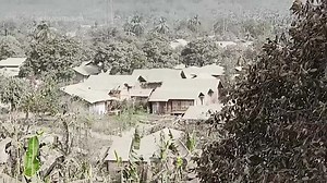 Volcano on remote Indonesia island continues to belch hot ash after deadly eruption