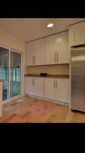 Custom Kitchen Transformation with Floating Shelves and Quartz Countertops