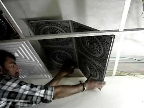 Installation of Drop In 24"x24" 2'x2' PVC Ceiling Tiles into Grid System