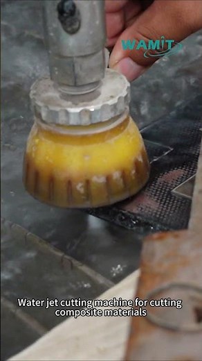 Water jet cutting machine for cutting composite materials