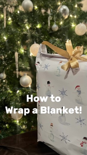 How to wrap a blanket! #giftwrapping #giftwrappingtutorial #wrappinggifts #giftwrappingideas #giftwrap #boston #howtowrap