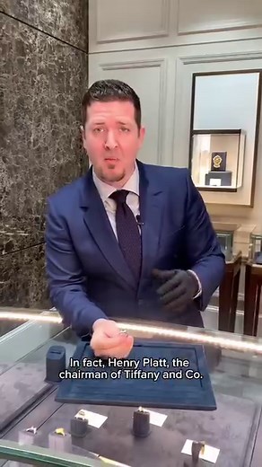 A phenomenally rare, vivid emerald green tsavorite garnet totaling 3.03 carats is the stunning centerpiece of this ring. Approximately 2.14 carats of gorgeous white accent diamonds surround the gem in a classic platinum setting. Exhibiting the perfect intense emerald green hue found only in the finest tsavorites, this gemstone is certified by the Gemological Institute of America (GIA) as untreated, meaning its color is entirely natural and has undergone no enhancements. The modified brilliant cu