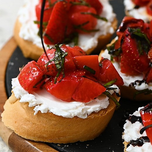 Recipe here: https://therecipecritic.com/bruschetta-recipe/ Easy Strawberry Bruschetta is an elegant appetizer that is vibrant and full of flavor! Fresh cut strawberries, warm goat cheese layered on a crunchy baguette slice, topped with a creamy balsamic glaze that melts in your mouth with every bite! | The Recipe Critic