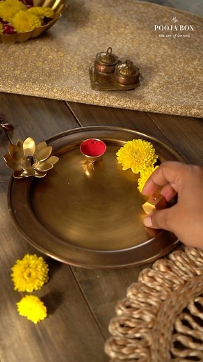 Made from brass, this Puja Thali holds a special place in every Hindu tradition be it Wedding, Engagement, Raksha Bandhan, Diwali or any other pooja ceremony. Aarti and puja rituals often call for thali decoration with diyas and puja samagri. This aarti thali is made of brass metal. It features an elegant antique brass detailing. The beautiful brass lotus fixed on its edge gives this pooja ki thali a refined look. Use it for pooja or gifting, this thali will surely attract attention! Product: Gr