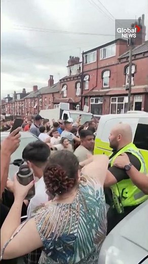 Chaos in Leeds as rioters set bus ablaze, overturn police car