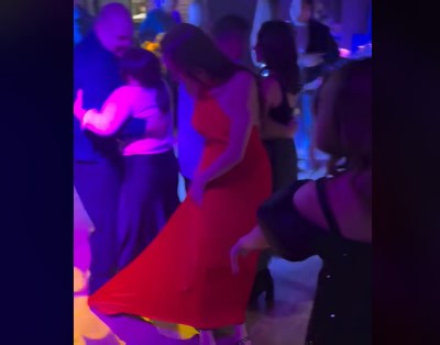 Dancing disaster occurs when man steps on lady's dress