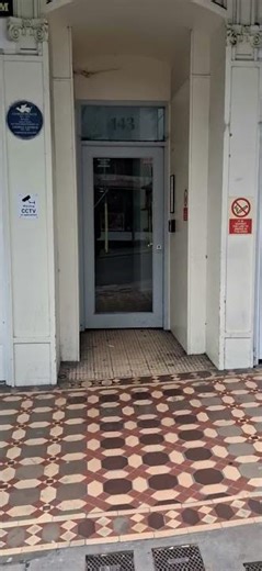 A TESSELLATED TILED SHOP ENTRANCE IN EXETER.