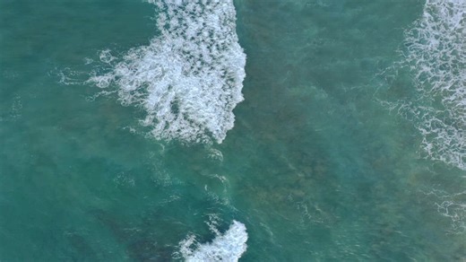 Waves moving slowly towards the sea shore - Free Stock Video