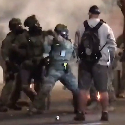 180K views · 447 reactions | Video shows federal agents pepper spraying and beating Navy veteran Christopher David with a baton during a protest in Portland, Oregon, on Saturday night. David said he “stood in the street in front of them and I started asking them if it was okay to violate their oath of the Constitution.” | cheddar news | Facebook